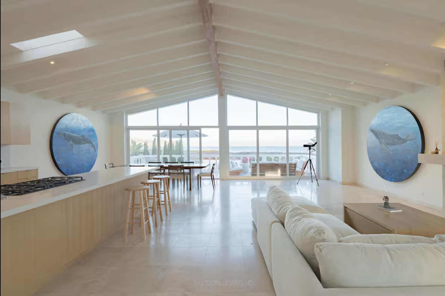 Casa Pulpo's sunlit living room opening toward the Pacific Ocean